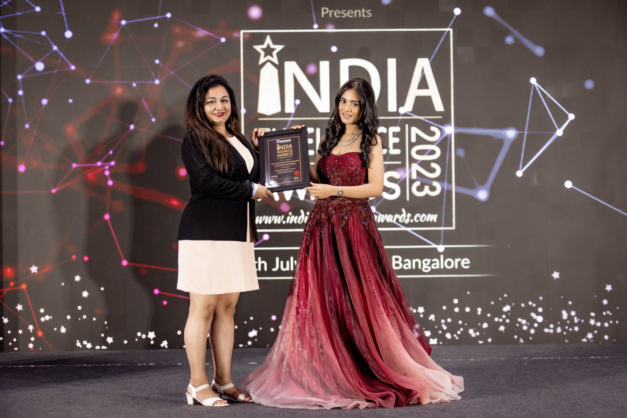 Tripti Chaturvedi, Founder of Arkido Web Services, receiving the India Excellence Award 2023 for Most Recommended Website Designing & SEO Company in Bangalore.